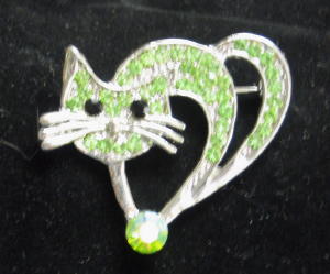 696- Le chat strass vert